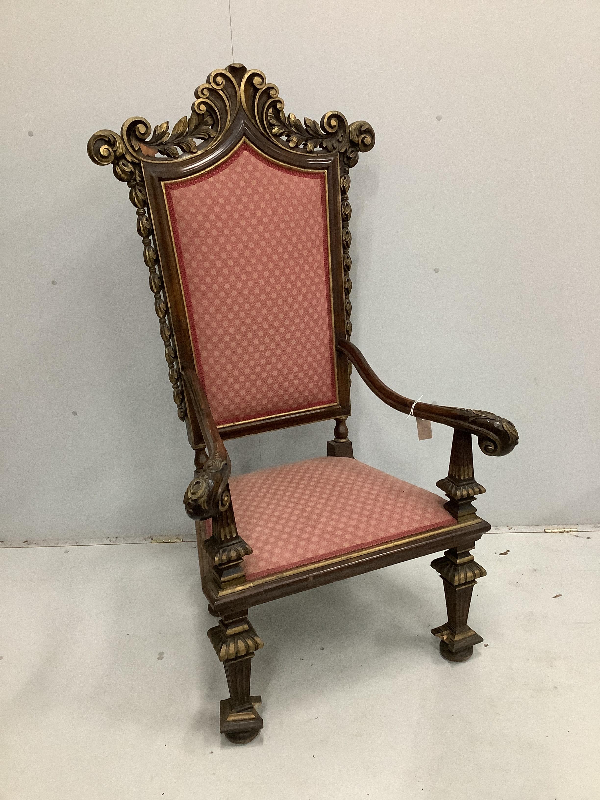 An 18th century style parcel gilt walnut high back elbow chair, width 78cm, depth 56cm, height 147cm